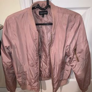 Soft pink bomber jacket .